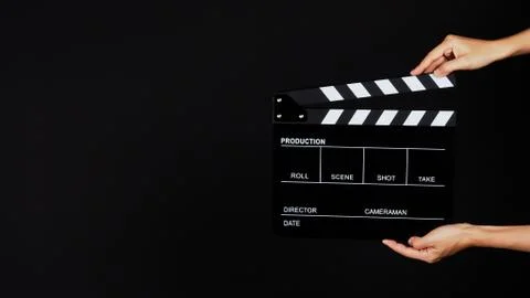 Two Hand's holding Clapperboard or movie slate use in video production ,film, Stock Photos