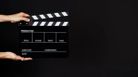Two Hand's holding Clapperboard or movie slate use in video production ,film, Stock Photos