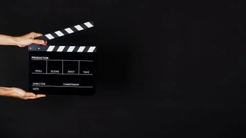 Two Hand's holding Clapperboard or movie slate use in video production ,film, Stock Photos
