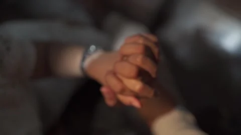 Two Hands holding HLG Slow Motion Stock Footage 246581088