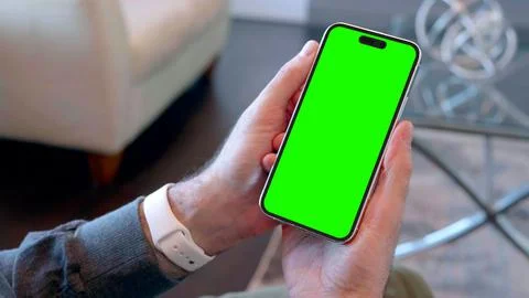 Two Hands Holding iPhone Pro Vertical Screen, Template Chroma Key Background Stock Photos