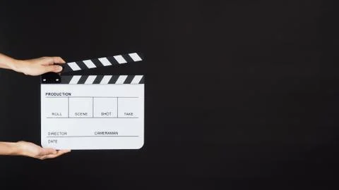 Two Hand's holding white Clapperboard or Clap board or movie slate use in vid Foto stock