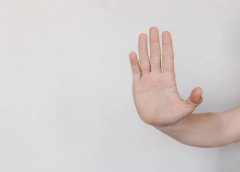 Two hands with indicate the direction on a light background Stockfoto's
