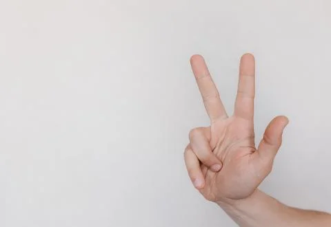 Two hands with indicate the direction on a light background Stockfoto's