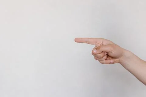 Two hands with indicate the direction on a light background Stockfoto's