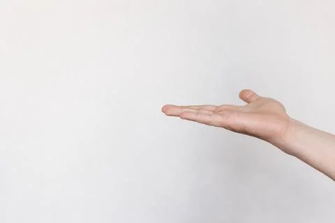 Two hands with indicate the direction on a light background Stock Photos