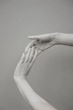 Two hands join on a background. Art concept. Stock Photos