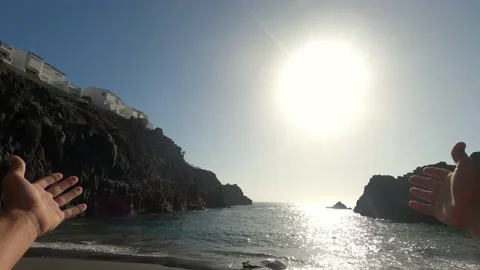 Two hands looking at opened arms having freedom and vacations lifestyle and conc Stock Footage 139046517