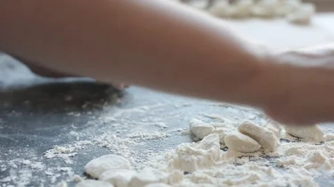 Two hands making dough for meat dumplings. Stock Footage 74522488