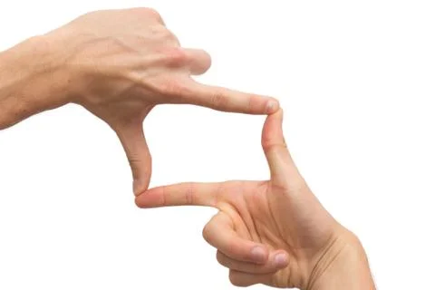 Two hands making a frame from fingers Stock Photos