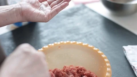 Two hands making meat dumplings Stock Footage 74343156