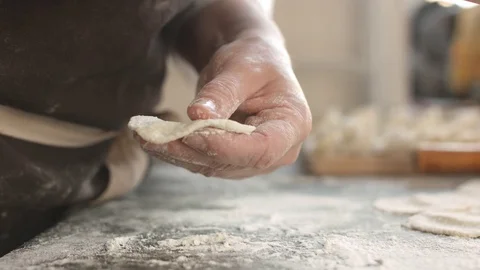 Two hands making meat dumplings. Stock Footage 74526055