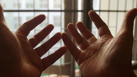 Two hands moving fingers gesturing in air against window Vídeos de archivo 333965141