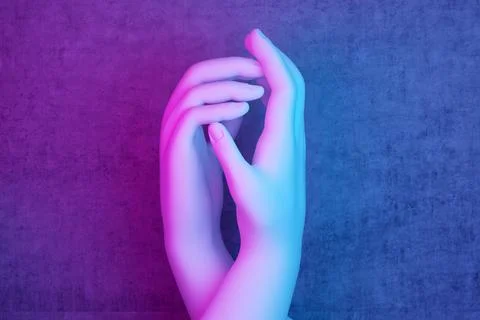 Two hands in pink-blue lighting 스톡 일러스트