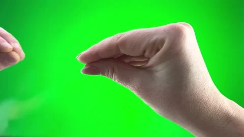 Two hands play on green background chromakey Man and woman they seem to be birds Video stock 231343783