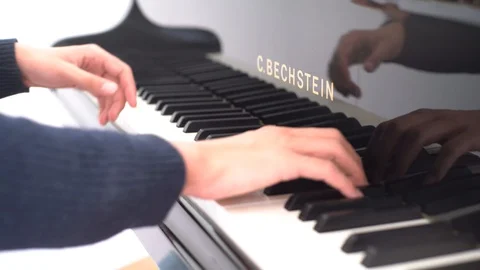 Two Hands playing difficult piece on grand piano in 4K Stock Footage 108901998