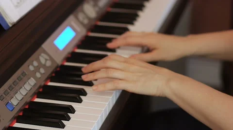 Two hands playing a gentle piece on a beautiful grand piano. Stock Footage 60207675