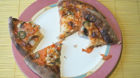 Two hands put pieces of pizza on the table Stock Footage 64890036