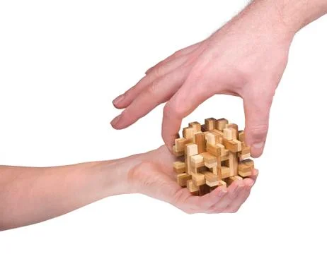 Two hands with a puzzle Foto stock