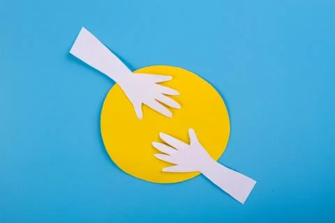 Two hands reaching for each other Stock Photos