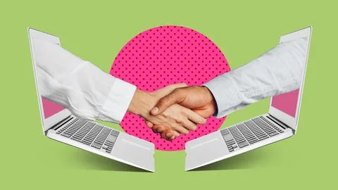 Two hands shake from laptops in a digital meeting to show teamwork and Stock Photos