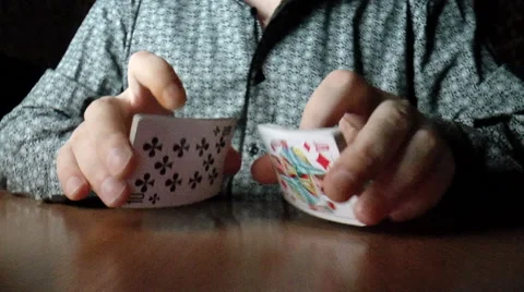 Two hands shuffling a deck of cards 動画素材 43197101