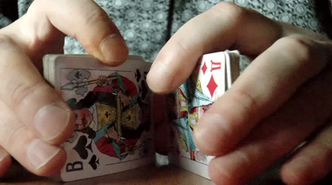 Two hands shuffling a deck of cards 動画素材 43197203