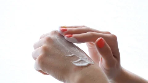Two hands smears with cream Stock Footage 121307103