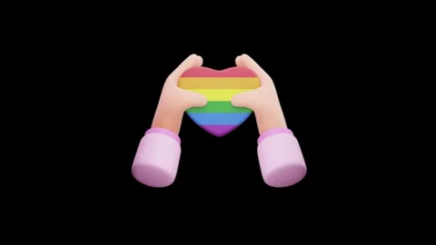 Two Hands Softly Holding a Plastic Matte Finished Rainbow Heart. Stock Footage 340283502