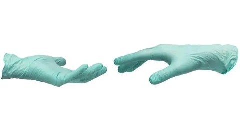 Two hands in sterile mint-colored nitrile gloves reach out to each other. Stock Photos