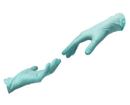 Two hands in sterile mint-colored nitrile gloves reach out to each other. Stock Photos