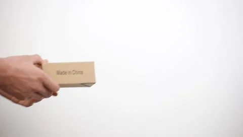 Two hands taking a box gift on white background isolation. Stockbeeldmateriaal 150331931