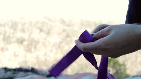 Two Hands Tie Webbing / Ropes For Climbing Stock Footage 47234939