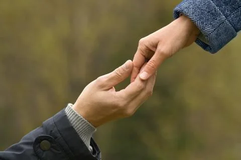 Two hands together Stock Photos