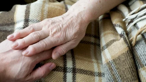 Two hands touch with each other Stock Footage 128657487