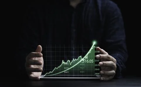 Two hands of trader protecting green graph chart with arrow for analysis st.. Stock Photos