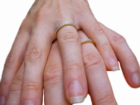 Two hands two rings and two hearts Stock Photos