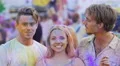 Two handsome men kissing beautiful woman on cheeks, best friends having fun 4k or 4k+ Resolution