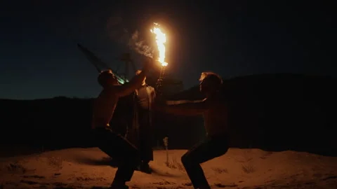 Two Handsome Men Performing Acrobatics Trick, Jumping Synchronously In Darkness Stock Footage 254318451