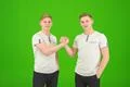 The two handsome twin greeting on the green background Photo