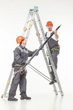 Two handymen at work stair Stock Photos