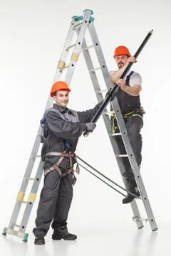 Two handymen at work stair Stock Photos