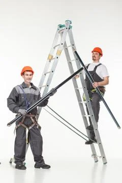 Two handymen at work stair Stock Photos