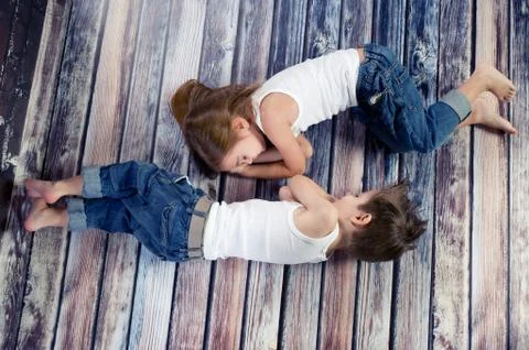Two happy kids in studio Stock Photos