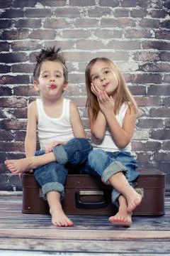 Two happy kids in studio Stock Photos