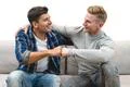 The two happy men greeting on the white background Photo