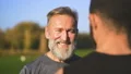 The two happy men talking outdoor. slow motion 4k or 4k+ Resolution