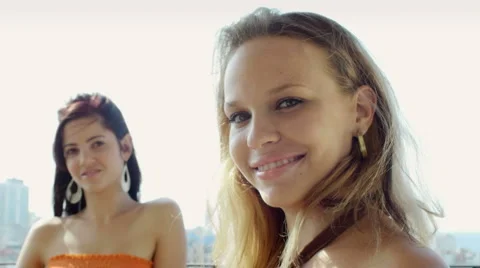 Two happy pretty teens smiling at camera Stock Footage 5295104