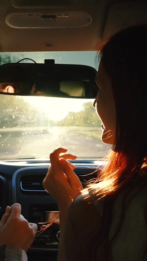 Two happy redhead young female friends dancing having fun driving car road trip Stock Footage 274039769