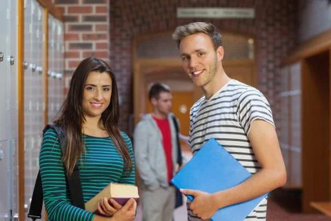 Two happy students looking at camera Stock Photos